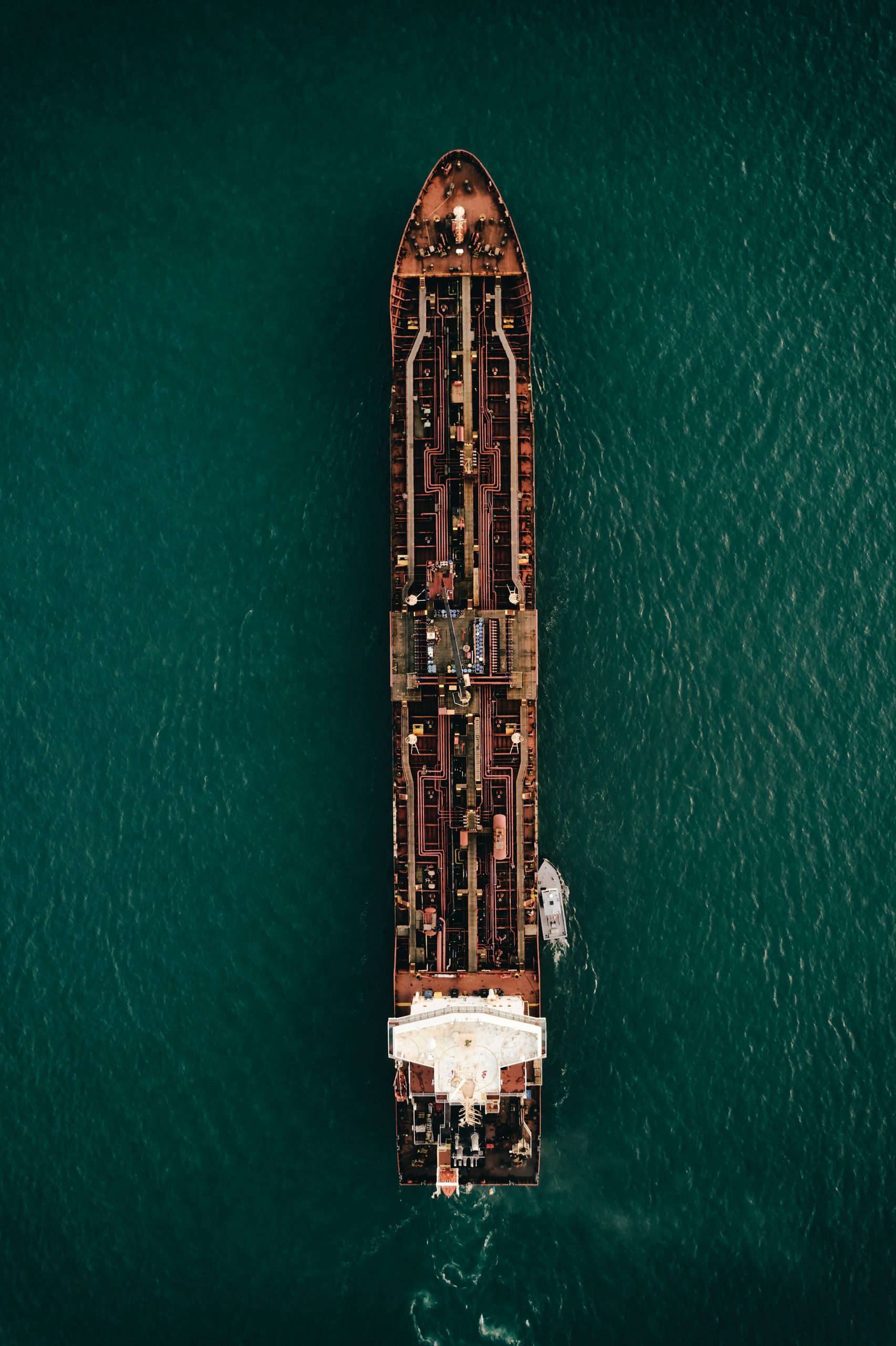Photo by Korie Jenkins aerial view of brown and white building on body of water during daytime